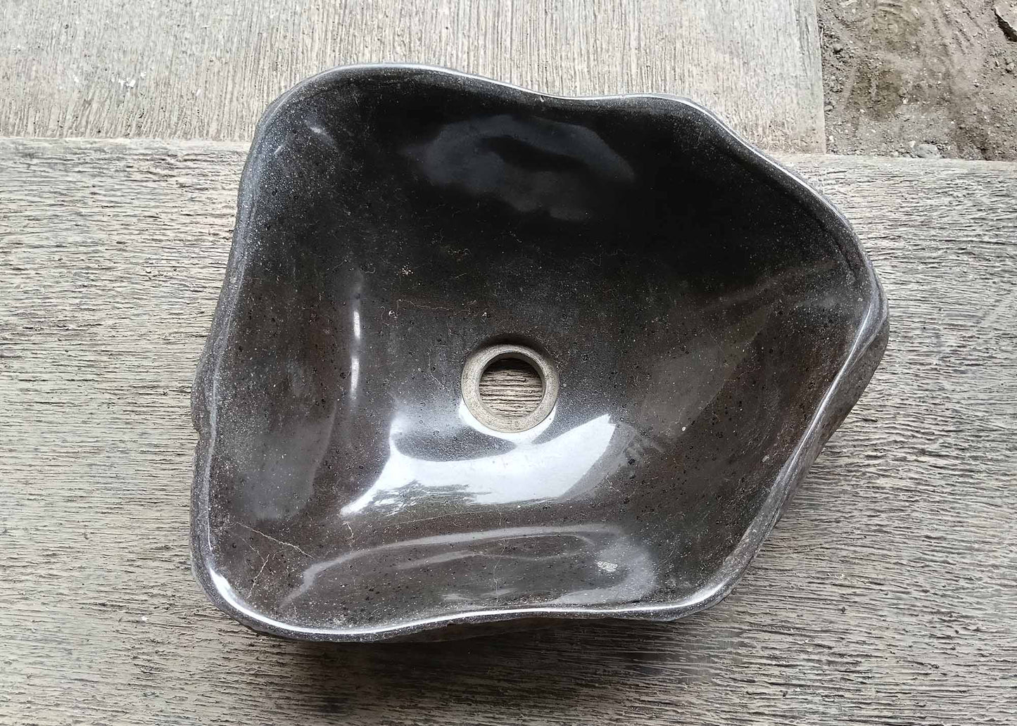 Top view of irregular river stone sink 6004-4033 with dark gray polished interior