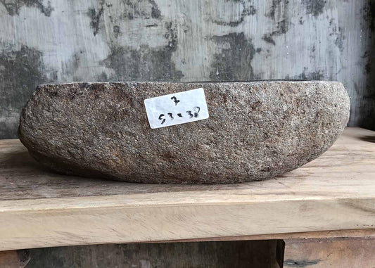 Front view showing rustic brown river stone sink SKU 6007-5338 with natural rugged surface and oval shape