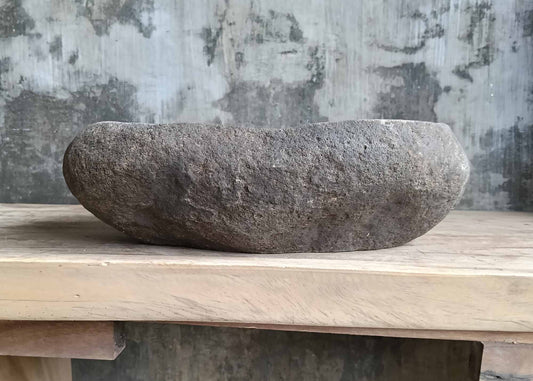 Front view of handcrafted stone sink 6018-4732 showing glossy finish and natural edges