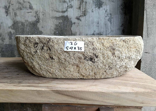 Front view showing beige rugged river stone sink SKU 6026-5435 with natural uneven edges and smooth interior finish