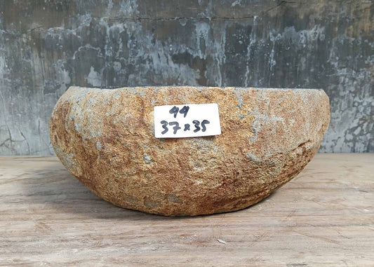 Front view of oval brown river stone sink 6044-3735 with rough texture