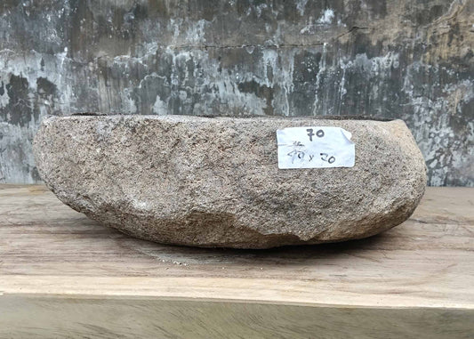 Front view of handcrafted stone sink 6070-4940 showing smooth surface and natural rugged rim