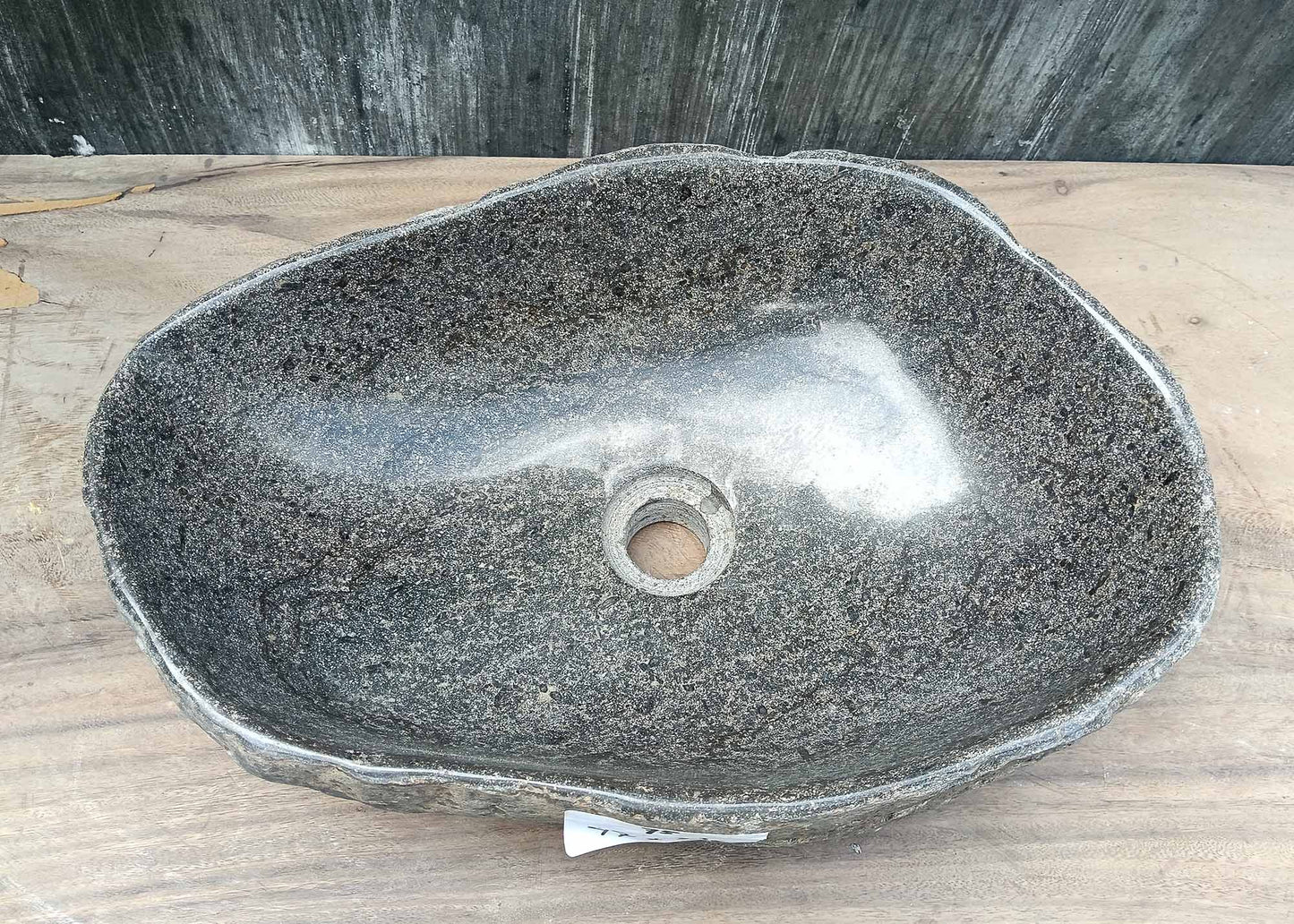 Top view of irregular river stone sink 6075-4733 with dark gray polished interior