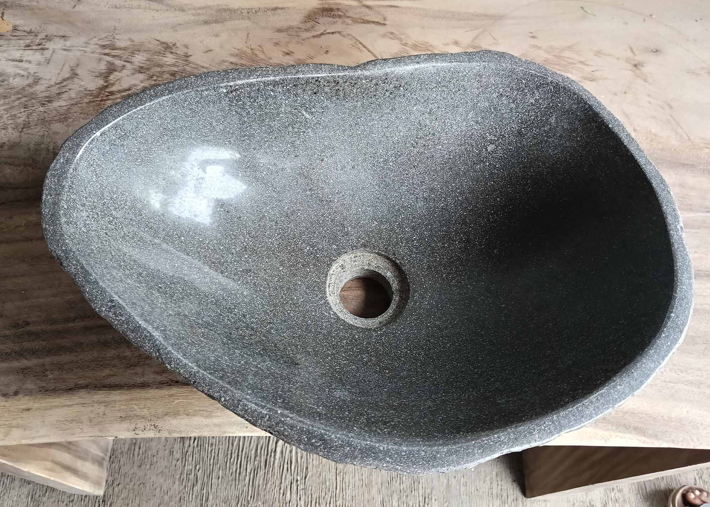 Top view of oval river stone sink 6080-4330 with smooth gray polished interior