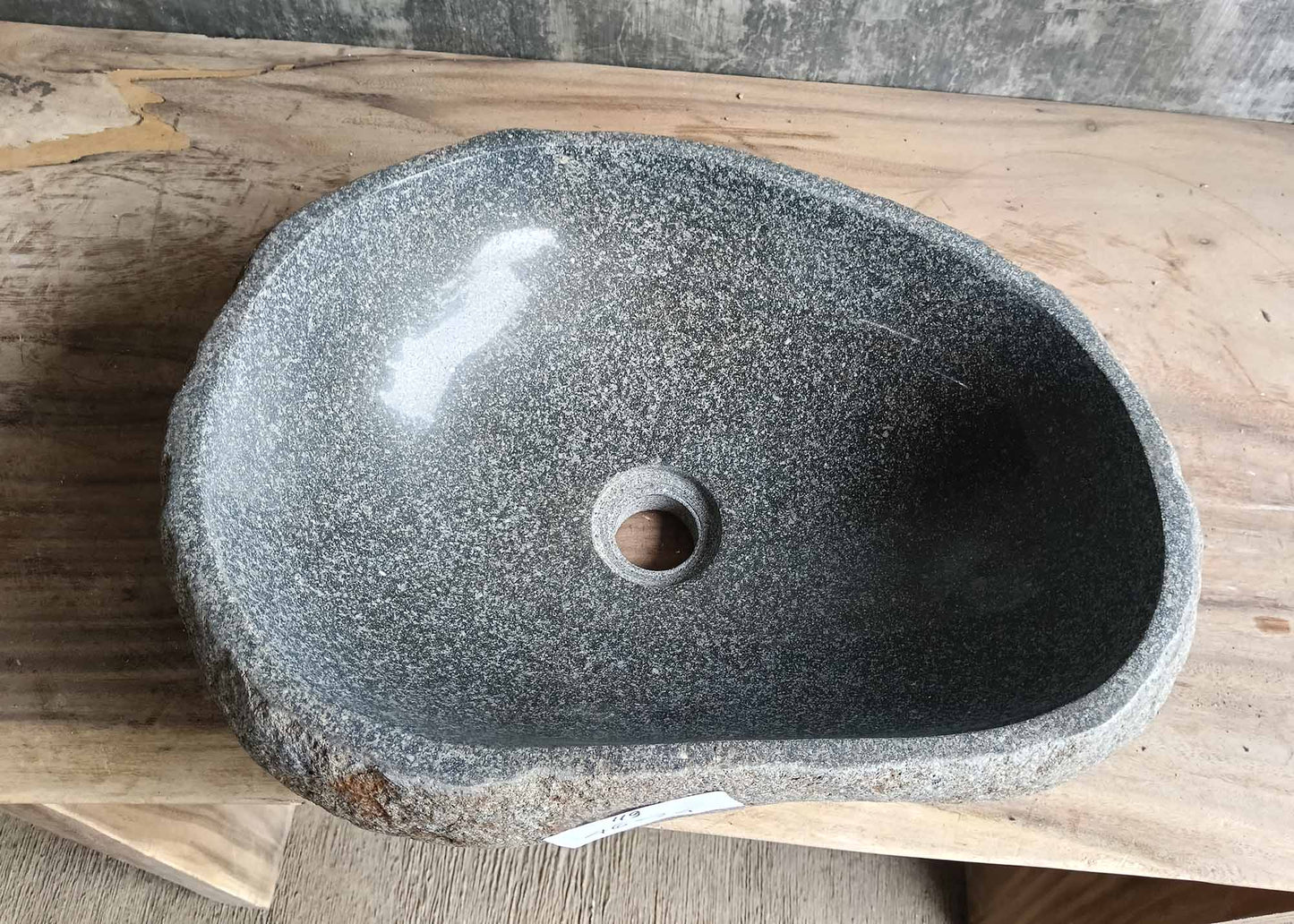Top view of oval river stone sink 6119-4634 with dark gray polished interior