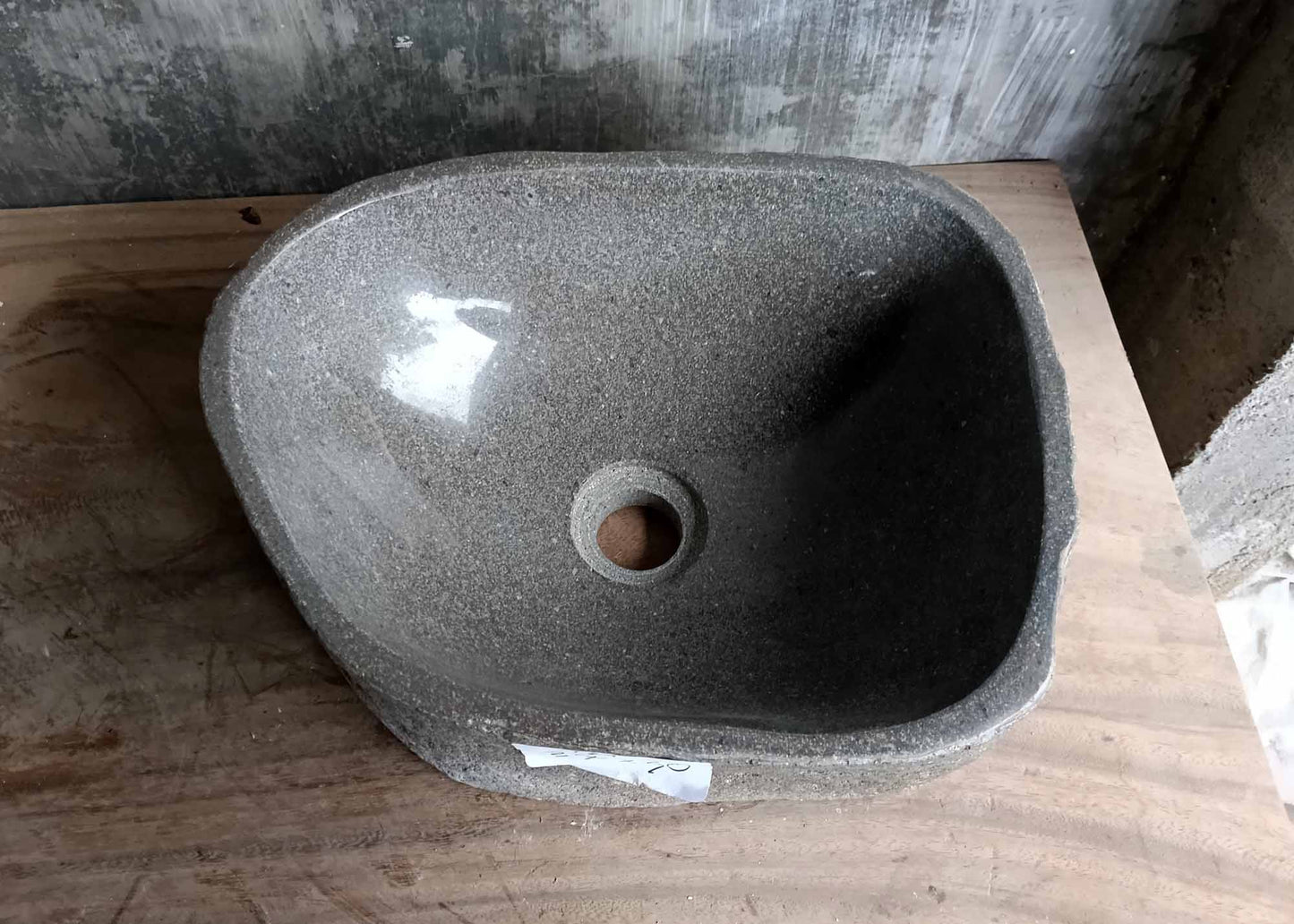Top view of rectangular river stone sink 6124-3730 with dark gray polished interior