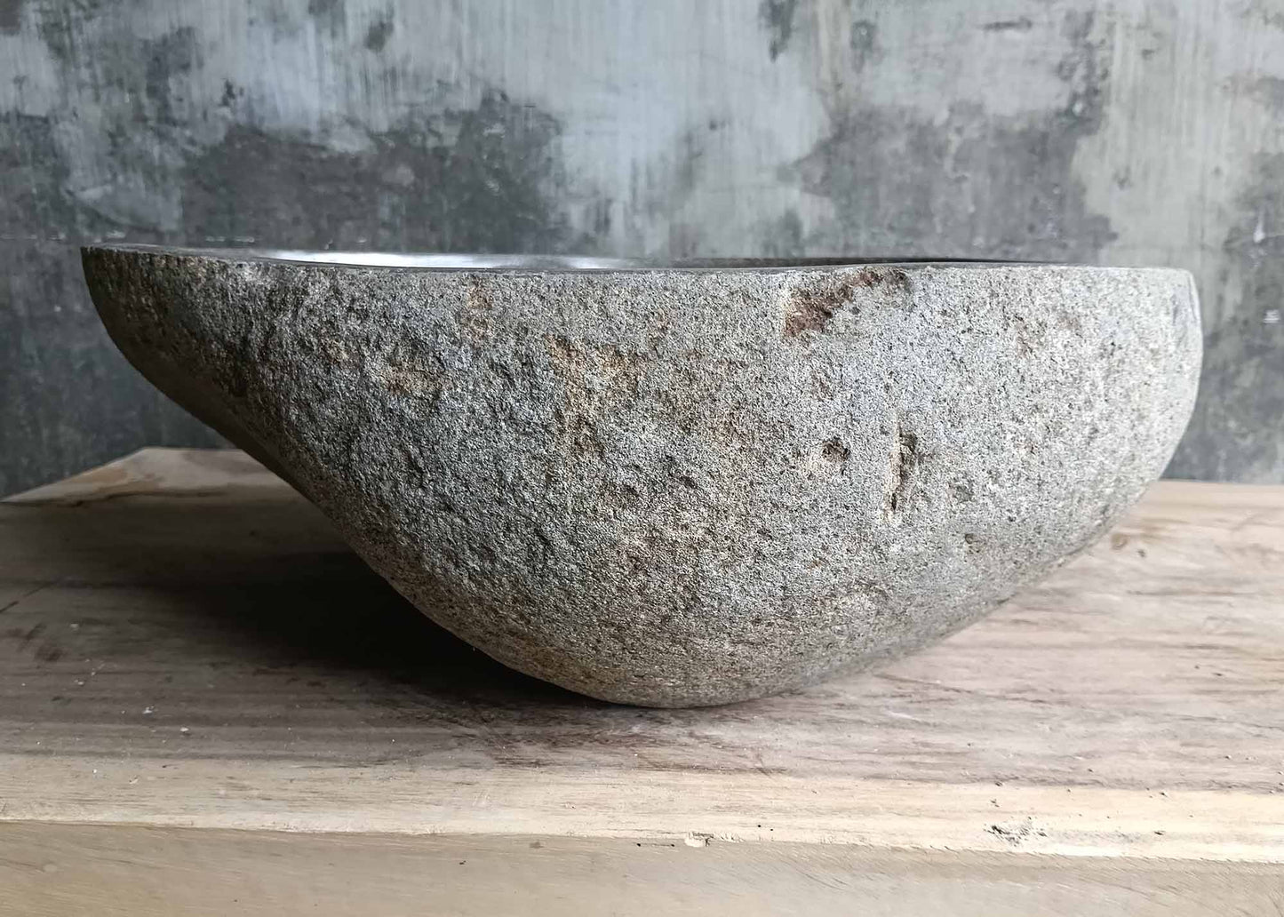 Back side of oval sink 6128-4236 highlighting natural stone shell