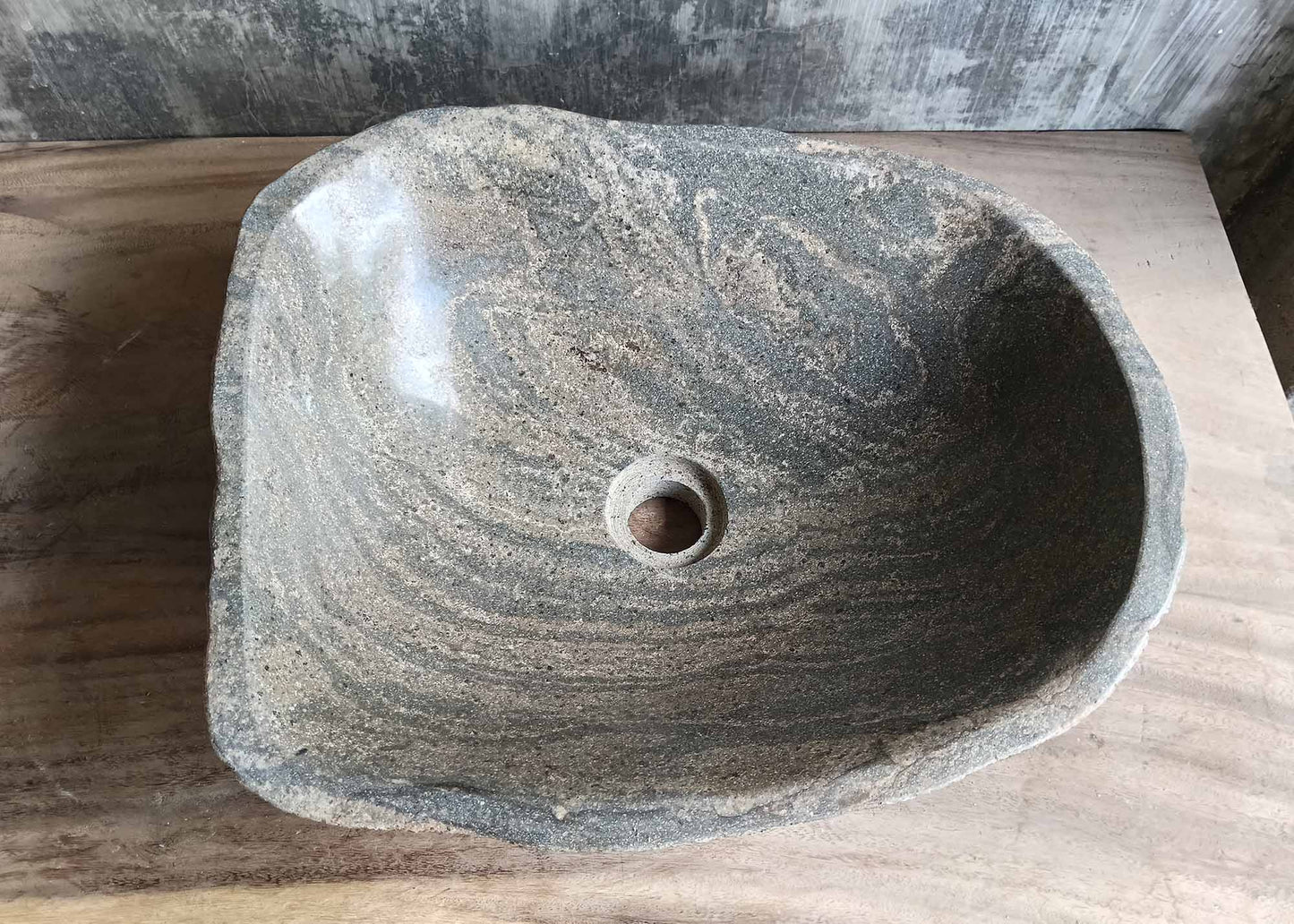 Top view of oval river stone sink 6133-4538 with swirling gray-beige interior
