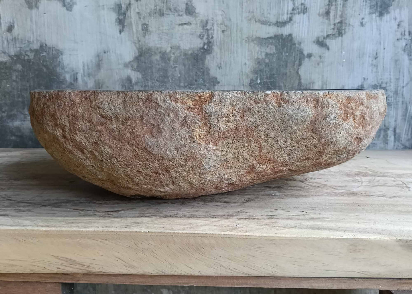 Right side view of sink SKU 6151-5038 showing textured granite shell and curved edge