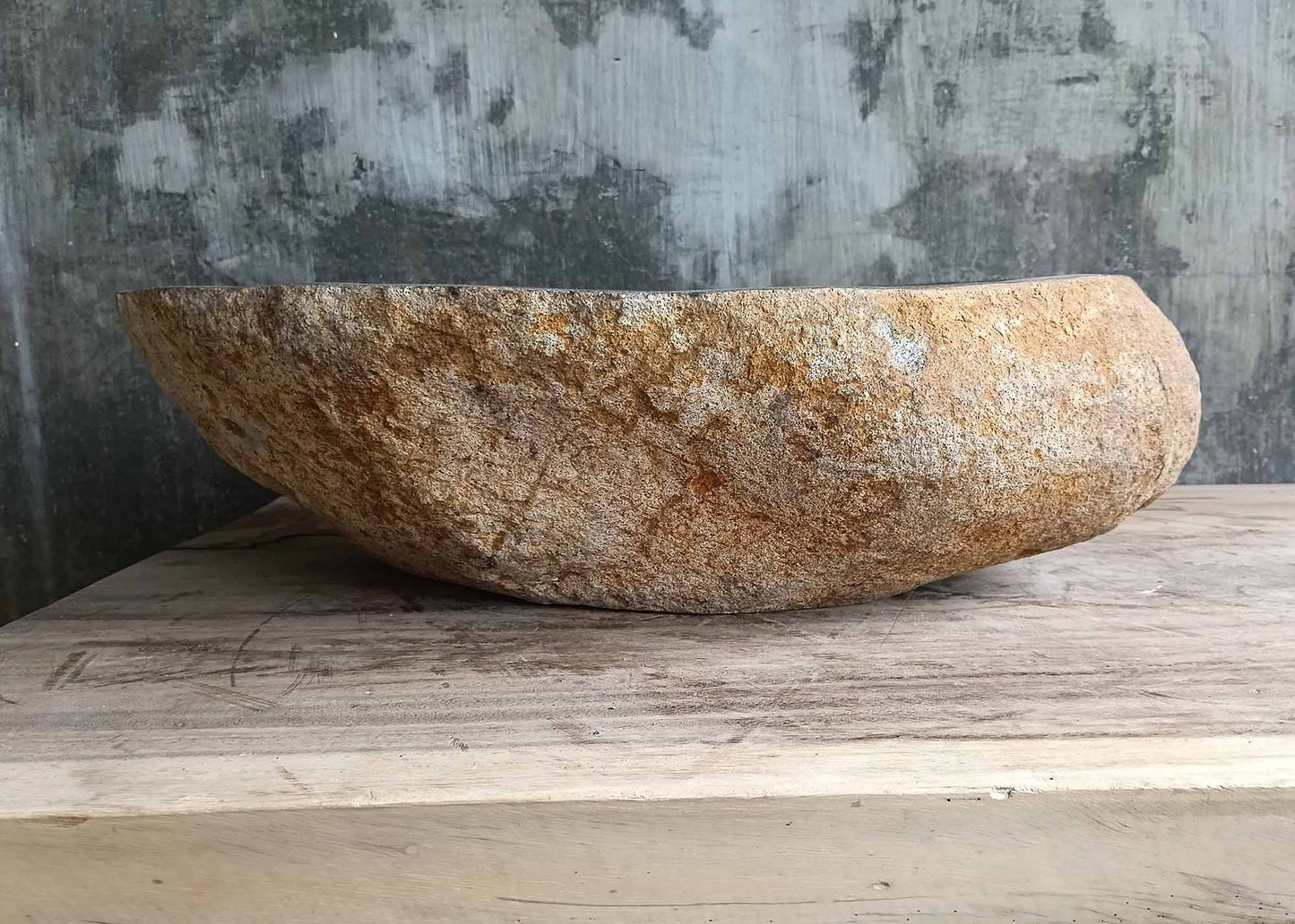 Rear view of handcrafted sink SKU 6170-5437 with natural rough surface and warm-toned granite texture