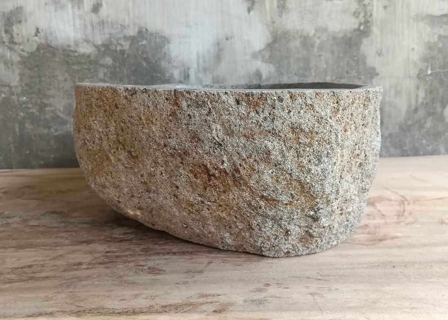 Left side view of gray 16×12 inch sink with boat profile and mineral details