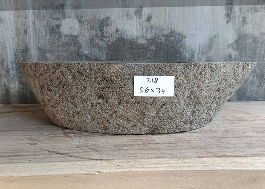 Front view of river stone sink SKU 6218-5634 with textured brown outer shell and tapered profile