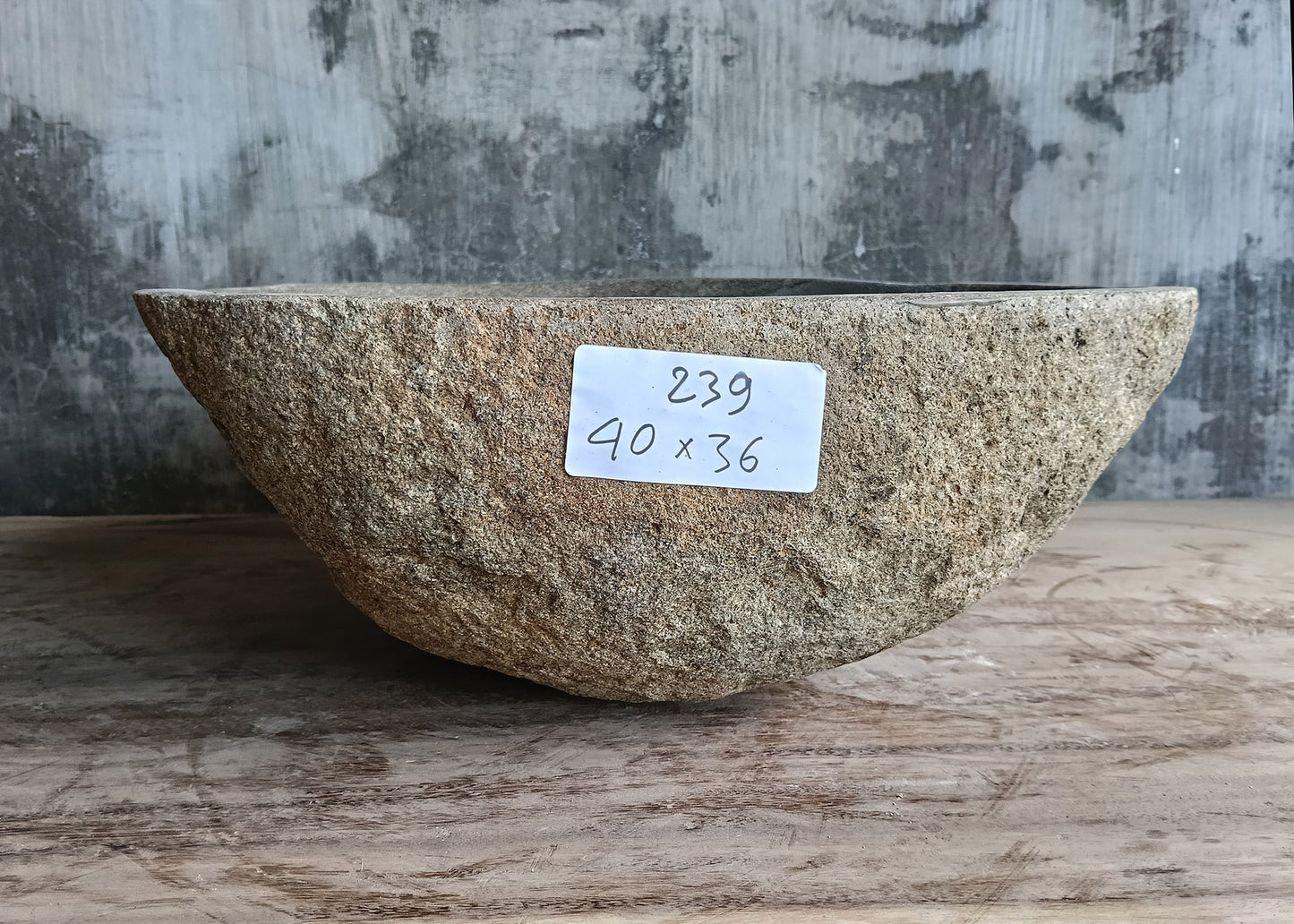 Back side of 16x14 sink with natural stone texture in gray-brown tones