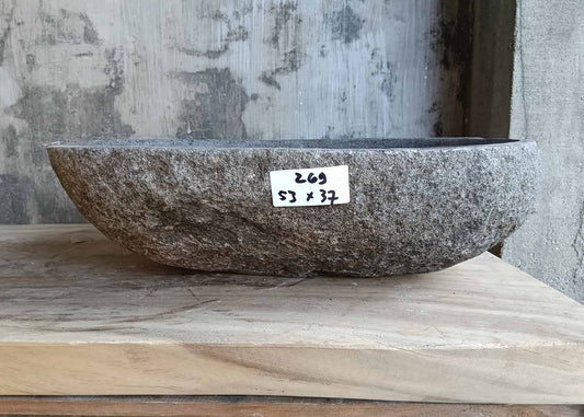 Front view of handcrafted sink 6269-5337 showing dark rugged exterior and organic stone texture