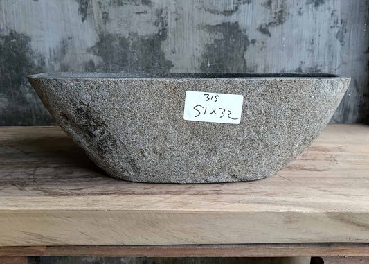 Front side of handcrafted sink 6315-5132 showing smooth contours and raw stone texture