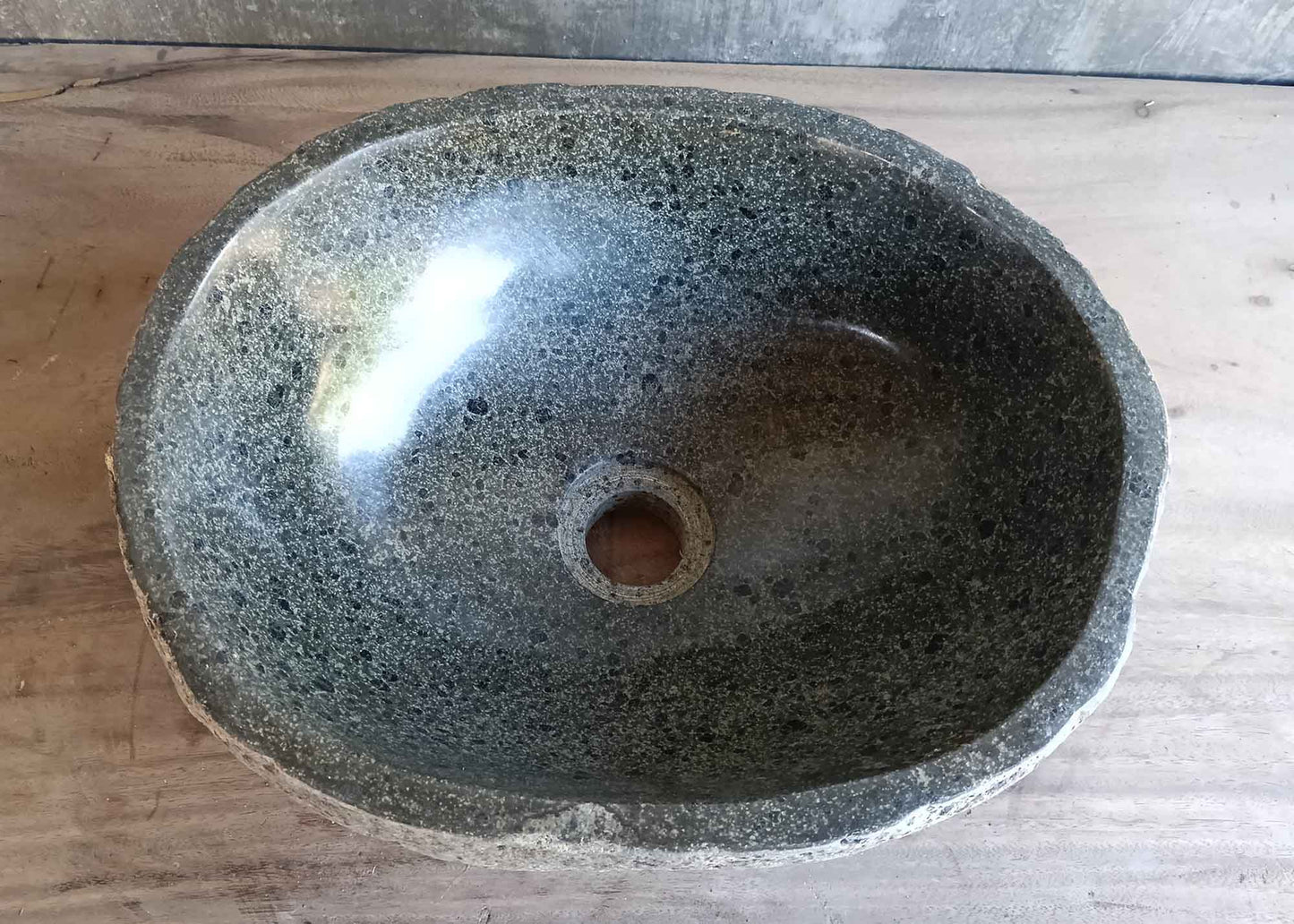 Top view of handcrafted gray 15×12 inch river stone sink