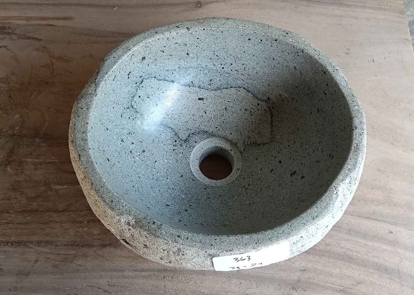 Top view of handcrafted light 13×11 inch round river stone sink with interior pattern