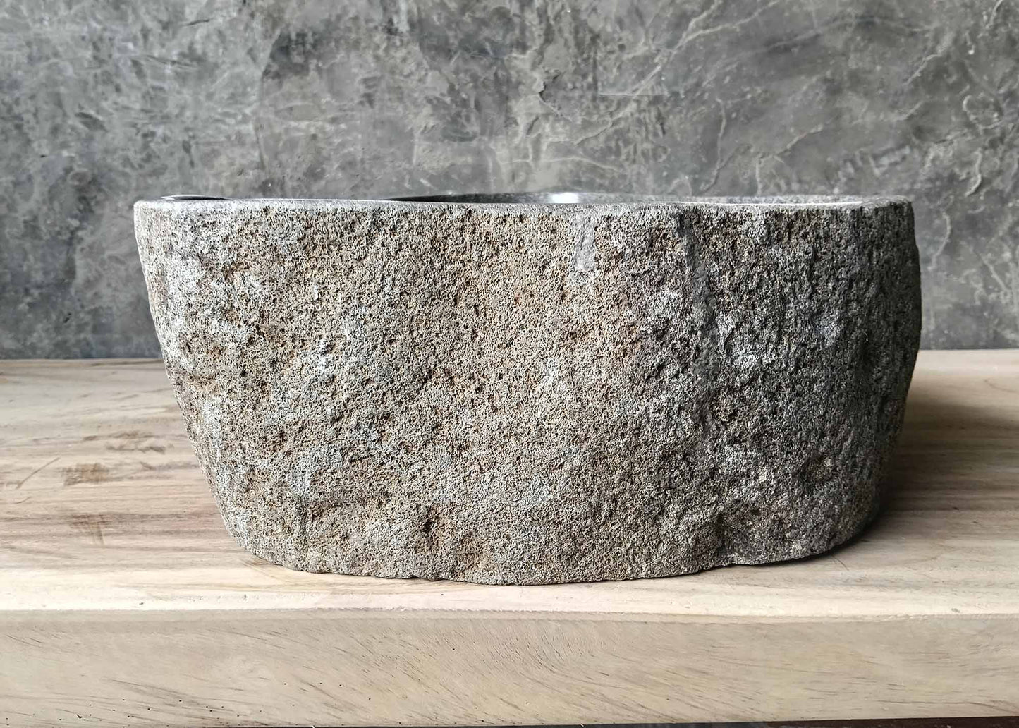 Earthy texture organic river stone sink – left side view