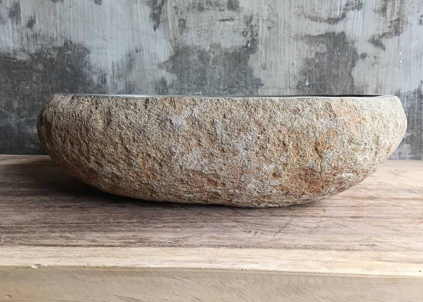 Back of oval stone sink showing raw textured surface – 6418-5240