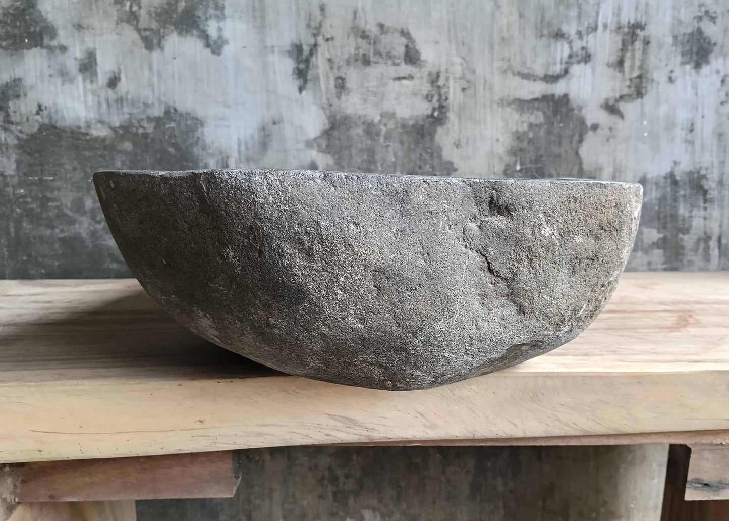 Left side of polished dark gray stone basin – 6430-5638