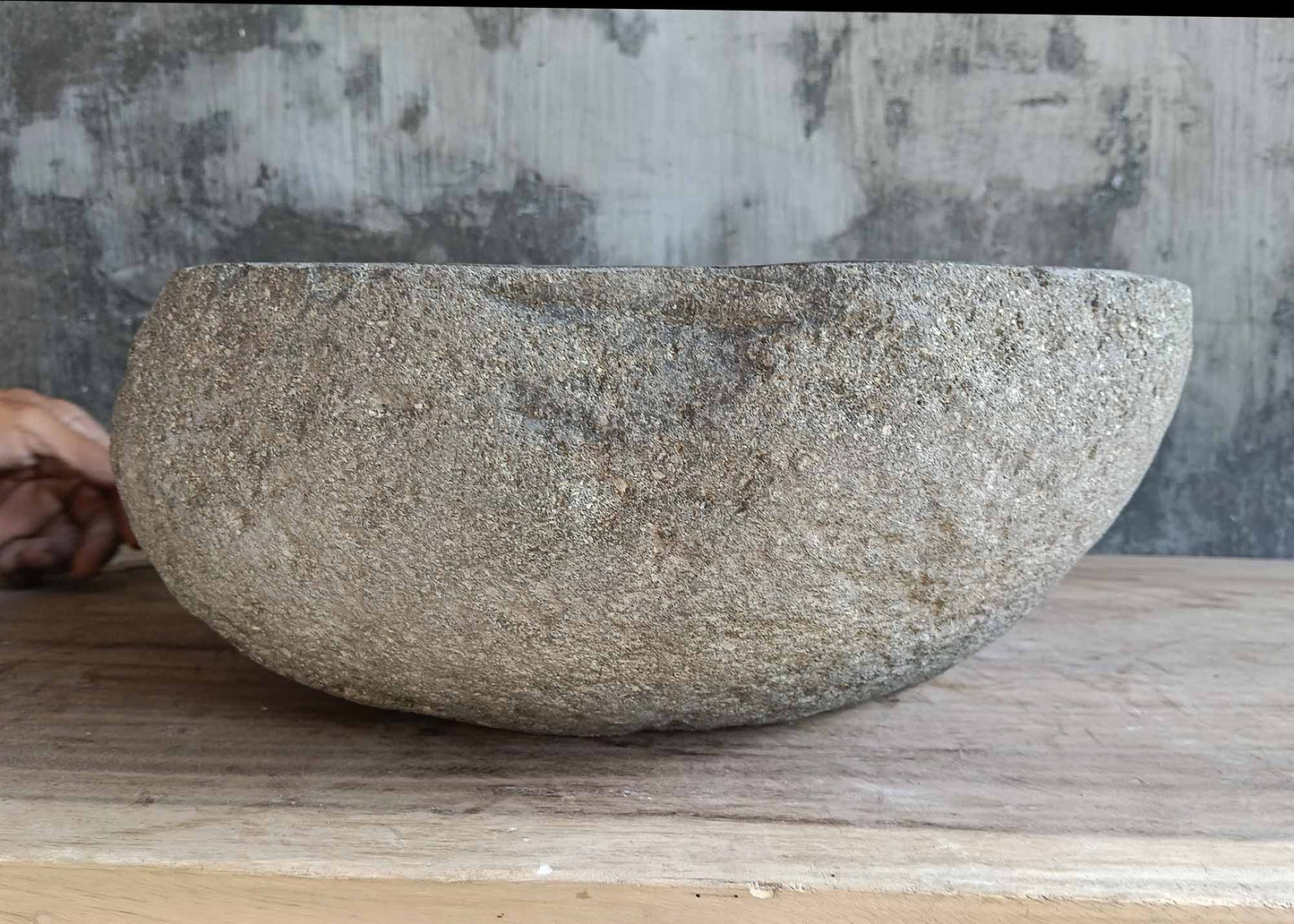 Right angle of oval basin 6452-4536 highlighting thick natural stone walls
