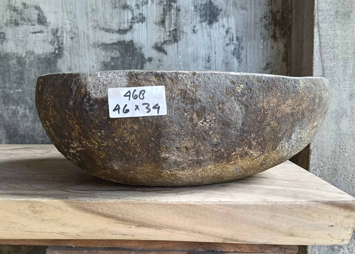 Backside of river stone sink 6468-4634 with golden-brown rugged texture