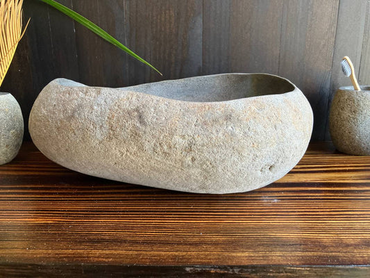 Front angled view of light-gray natural river stone sink RSS-015
