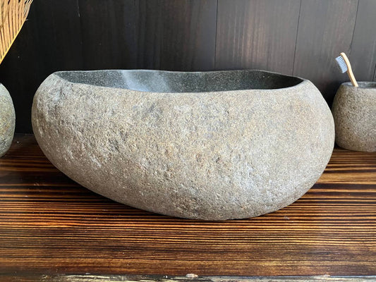 Front view of rounded oval river stone sink RSS-029