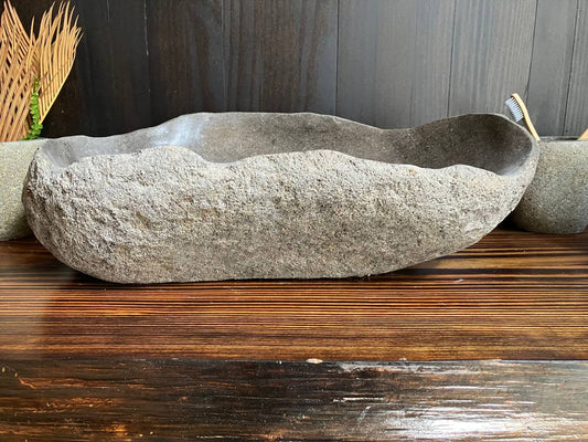 Front view of asymmetrical natural river stone sink RSS-037