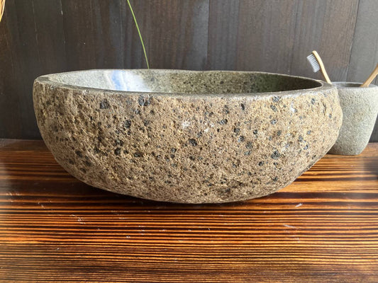 Front view of compact brown river stone sink RSS-046