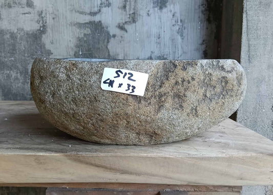 Front view of sink 6512-4133 with natural textured stone exterior in beige tones