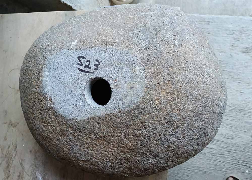 Bottom of sink 6523-4033 with rough stone base and centered drain hole