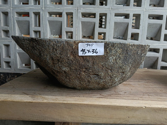Front view of 6705-4336 natural river rock vessel sink, 3-sided organic shape