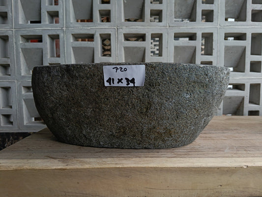 Front view of 6720-4134 natural river rock vessel sink, compact organic shape