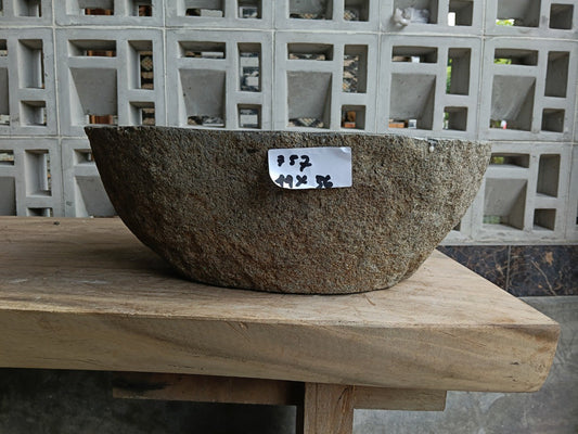 Front view of 6757-4436 natural river rock vessel sink, elongated organic shape