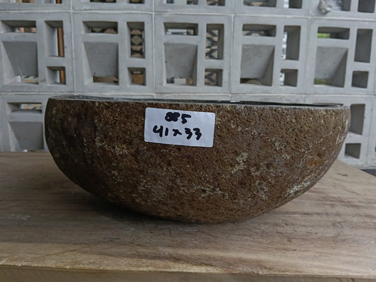 Front view of 6885-4133 natural river rock vessel sink, compact organic shape