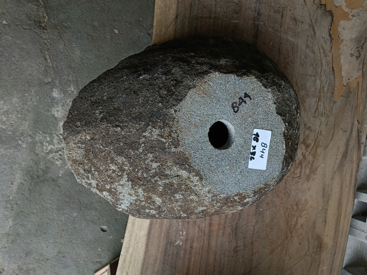 Bottom view of 6844-4836 solid river rock sink, carved from one piece