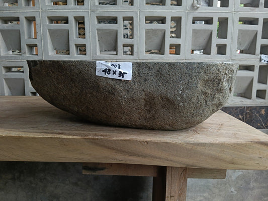 Front view of 6803-4835 river stone vessel — polished interior bowl