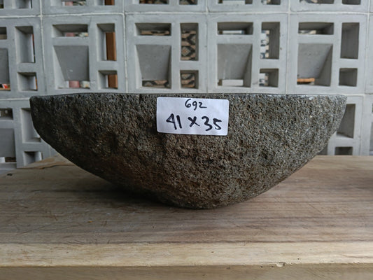 Front view of 6692-4135 river stone vessel — polished interior bowl