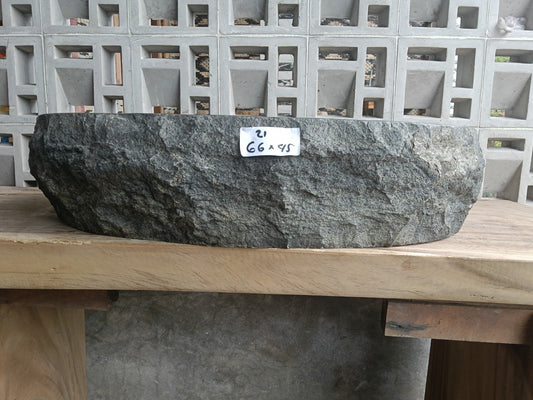 Front view of handcrafted oval andesite bathroom sink