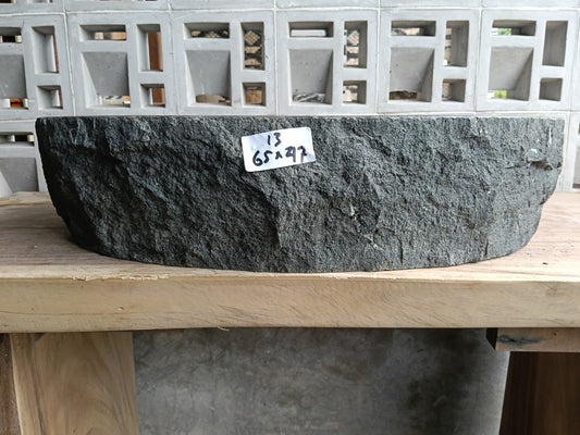 Front view of handcrafted oval andesite bathroom sink