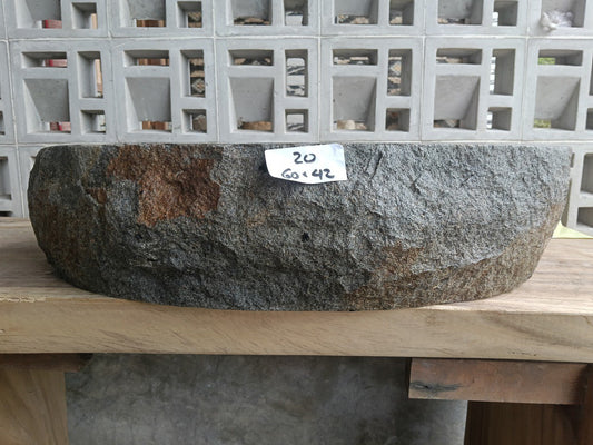 Front view of handcrafted oval andesite bathroom sink