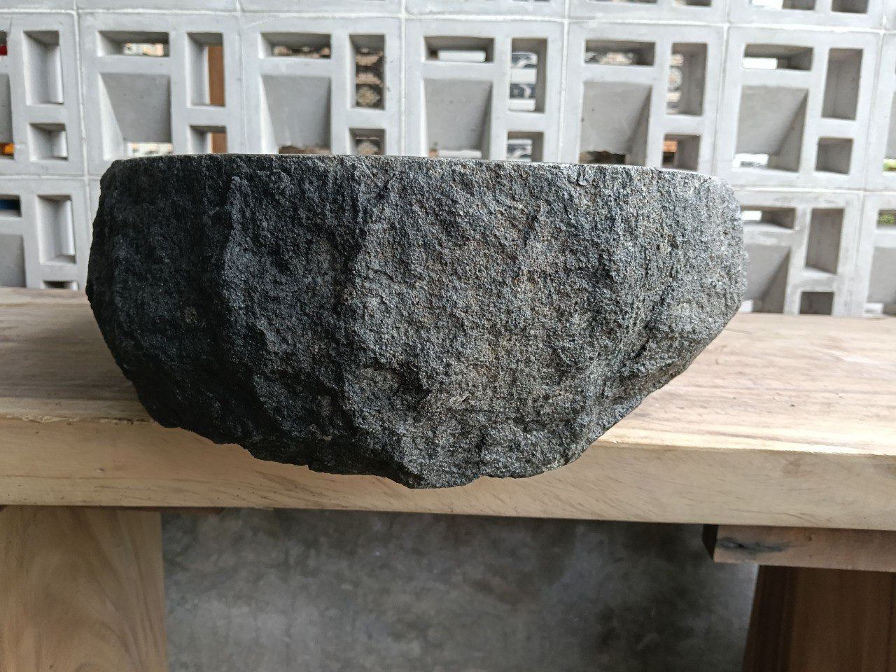 Back view showing split-rock exterior of andesite sink