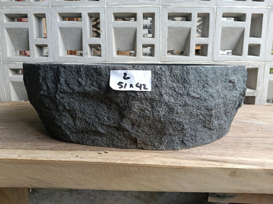 Front view of handcrafted oval andesite bathroom sink