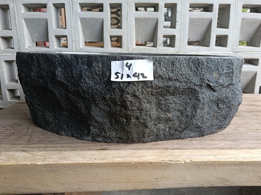 Front view of handcrafted oval andesite bathroom sink