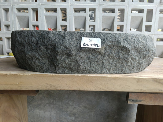 Front view of handcrafted elongated oval andesite bathroom sink