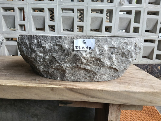 Front view of handcrafted oval gray marble bathroom sink