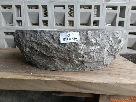 Front view of handcrafted gray marble bathroom sink