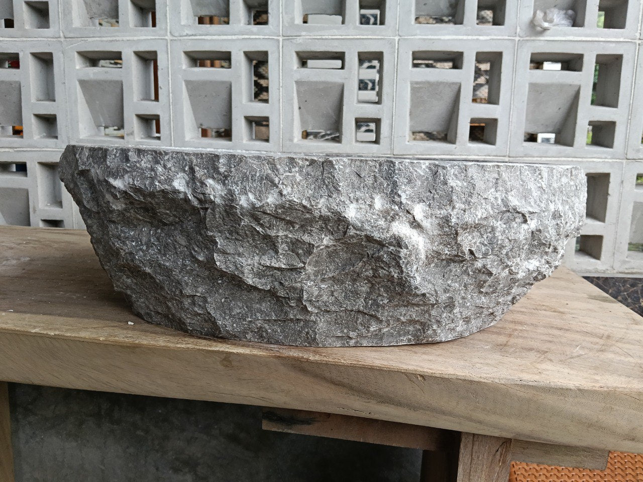 Right side angle of gray marble bathroom sink