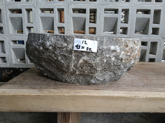 Front view of handcrafted gray marble bathroom basin